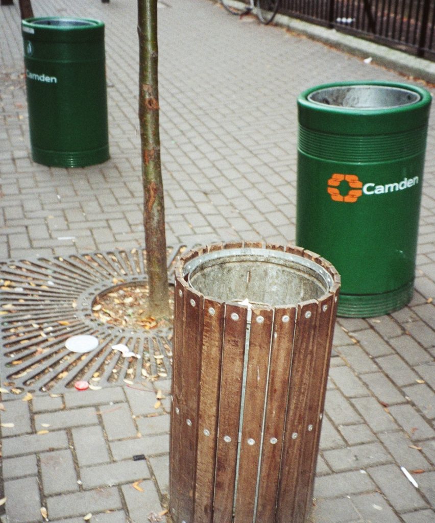 Photograph of three different styles of litter bin adjacent to each other